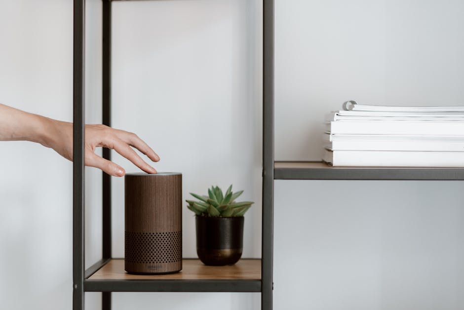An assortment of smart home assistant devices arranged on a desk