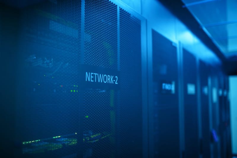 Home network rack with networking equipment side-by-side comparing gateway options