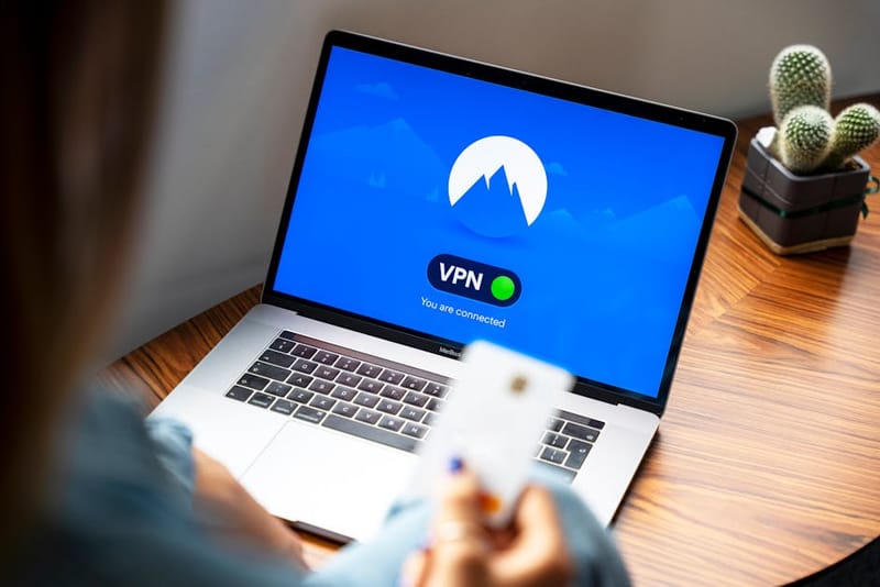 Laptop with privacy padlock overlay representing VPN tunnel encryption