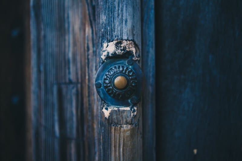 Wired video doorbell at a UK front door